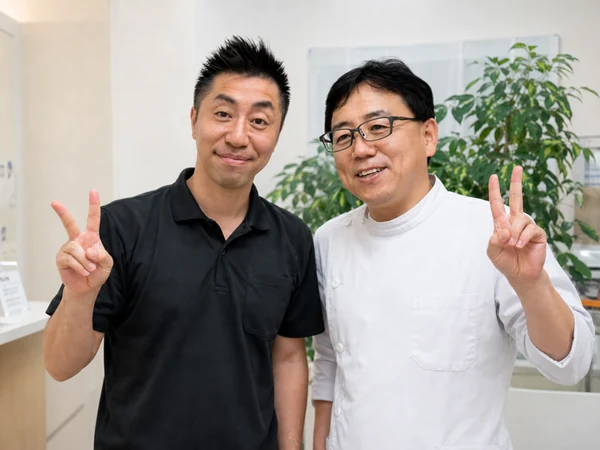 院長 李光林と推薦者の写真